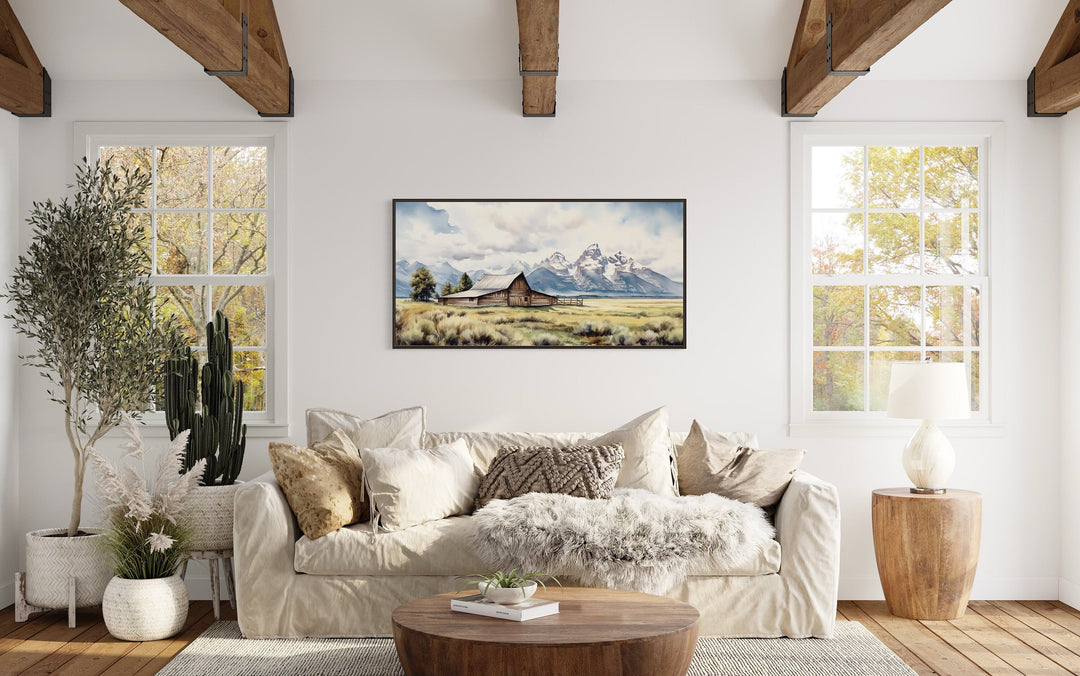 Moulton Barn In Grand Teton National Park Wall Art "Teton Heritage" hanging over beige couch