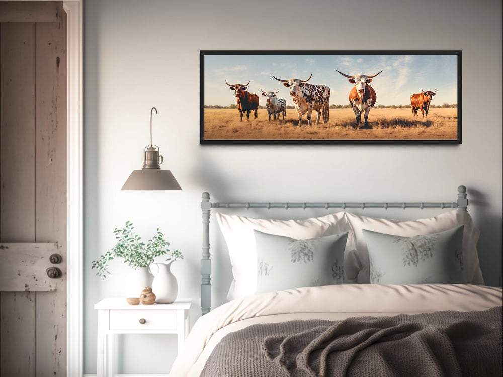 Herd of Texas Longhorn Cows Panoramic Wall Art "Quintet Horizon" over rustic bed