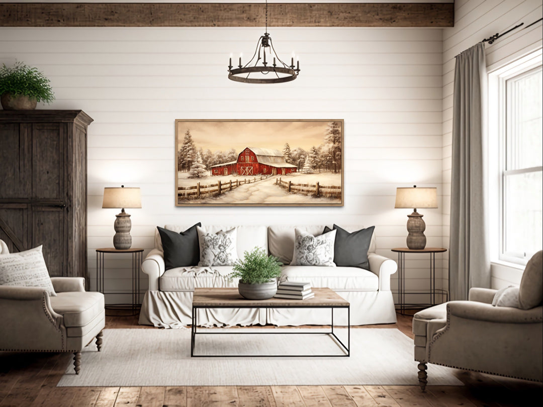 Oak framed Red Barn In Snow Winter Wall Art "Winter Homestead" hanging over rustic couch
